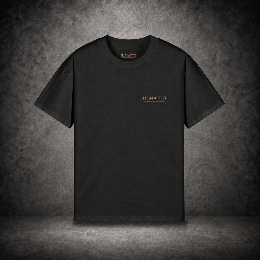 IL MATTO Everyday black tee with small antique-bronze chest wordmark — branded hero