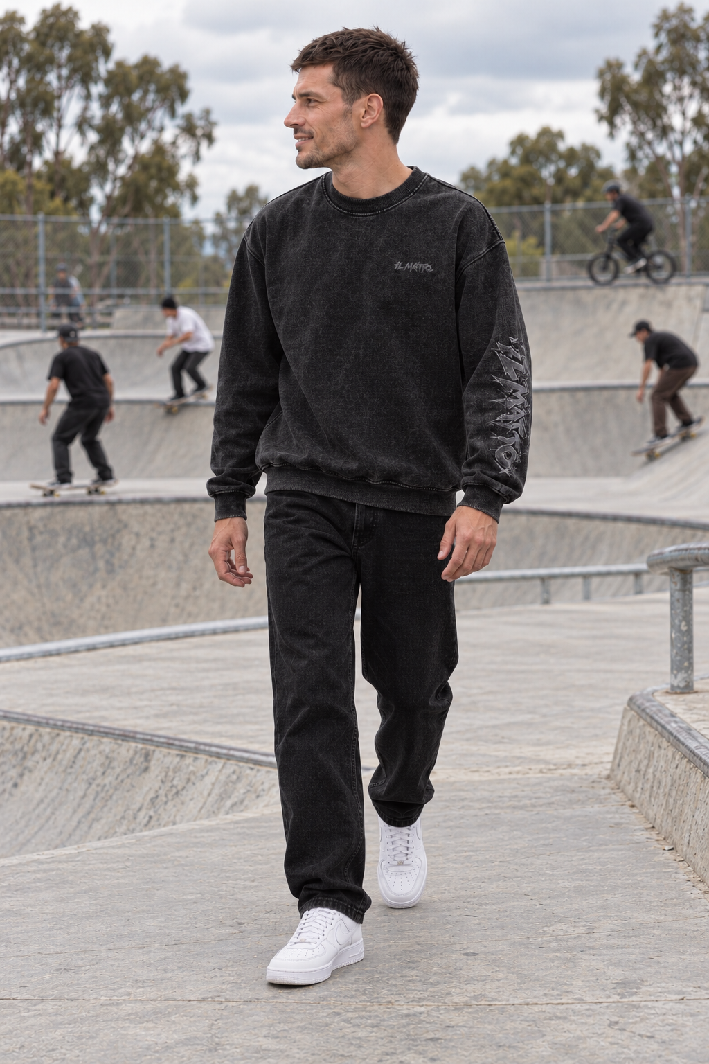 IL MATTO Signature Graffiti Crew — candid front skatepark lifestyle styling mockup with skaters and BMX riders
