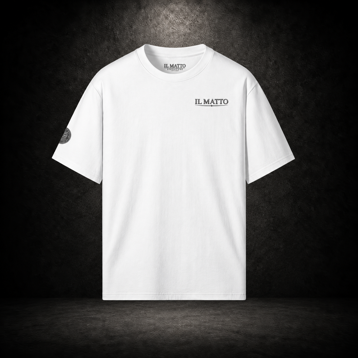 IL MATTO Signature Tee — white front on charcoal studio background